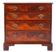 A mahogany rectangular chest, in the Georgian taste, the top with a moulded edge,