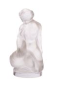 A Lalique Cristal figure of Leda and the swan modelled in kneeling posture, 12cm high,