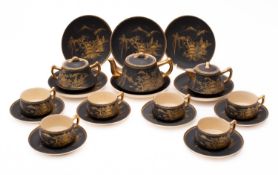 A Satusma pottery tea service, comprising a teapot and cover, hot water jug and cover,