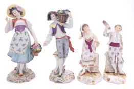 Two pairs of German porcelain figures in 18th century style, on scrollwork mound bases,