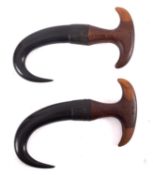 A pair of 19th Century horn boot pulls, initialled R.I.G.I, 13cm long.