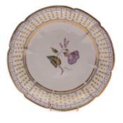 A similar Nantgarw lobed circular botanical dish decorated in London with a convolulus spray named