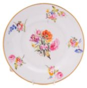 A Swansea plate painted by Henry Morris or William Pollard with a central bouquet of flowers