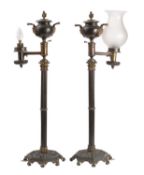 A pair of George IV or William IV patinated and parcel gilt bronze table oil lamps,