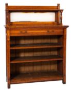 A Victorian oak bookcase, by Gillow of Lancaster,