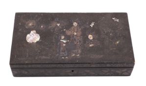 An Oriental lacquered wood box containing a collection of engraved mother of pearl and shell