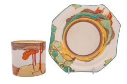 A Clarice Cliff Bizarre preserve pot and an octagonal stand decorated in the 'Coral Firs' and