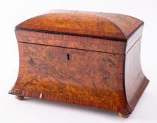 A Regency burr walnut and crossbanded tea caddy, early 19th century; of waisted rectangular form,