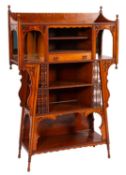 An Aesthetic Movement walnut bookcase/Side Cabinet, of tapered form,