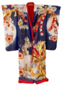 A Japanese Kimono embroidered with cranes,