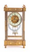 A mid-Victorian French four-glass mantel clock having an eight-day duration movement striking the