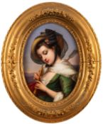 A pair of Berlin porcelain oval portrait plaques of an Italian shepherd boy and girl after Leopold