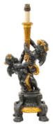 A patinated and painted metal figural table lamp in 18th century style,