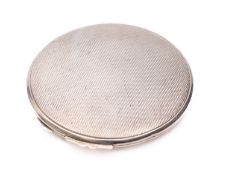 A George VI silver powder compact by Cohen & Charles, Birmingham 1950,