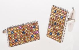 A pair of sapphire cufflinks, the rectan