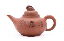 A Chinese Yixing teapot and cover of com