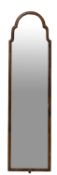 A walnut framed wall mirror in Queen Ann