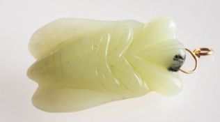 A jade pendant, carved in the form of a