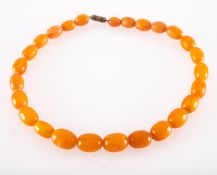 A copal amber bead necklace, with screw