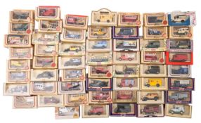 Lledo and others. A boxed collection of vintage military and commercial vehicles in two boxes.