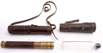 A glass and silver plated Hunting flask in a leather case with a two draw brass and leather