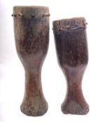 Two antique native carved wood drums, one lacking a drum skin (2) .