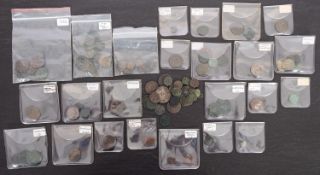 A collection of higher grade Roman base coins in packets and loose.