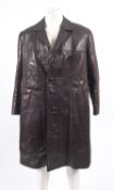 A vintage dark brown leather trench coat.