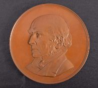 A large bronze medal bust of Gladstone,