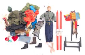 Palitoy Action Man. An unboxed figure together with a collection of uniform and accessories.