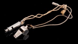 An' Acme Thunderer' whistle and a 'The Metropolitan' whistle (2)