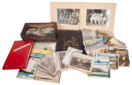 An accumulation of various early 20th century and later postcards,