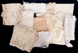 A collection of various lengths of lace, including handmade C17th Flemish lace,
