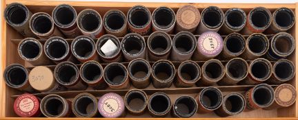 A collection of approximately 93 Indestructible cylinders..