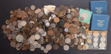 A mixed lot of British and world coins.