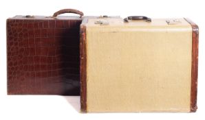 An Army & Navy brown leather simulated crocodile skin suitcase and one other suitcase (2)