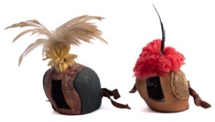 Two leather falconry hoods, with feather crests, reputedly gifted to the vendor R.B (Dick).