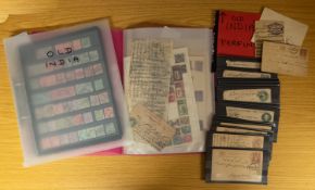 Various stamps and postcards in three photo albums, a stockbook,
