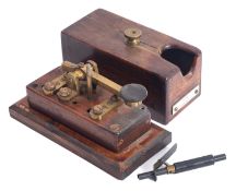 An oak cased Morse key labelled 'Point Pleasant JCT', 9x19x11cm.