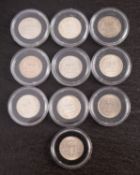 Ten George VI sixpences.