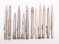 A group of twelve various silver plated propelling pencils various makers