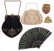 A late 19th century bead work purse with gilt metal mounts,