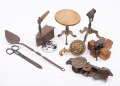 An early 20th century brass lever action butter or biscuit press, unsigned,