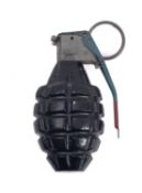 A practice Mills Grenade, with sprung lever stamped 'Fuze M228'.