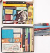 A collection of various propelling pencil refills in original boxes,