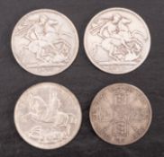 Two 1890 Crowns, a 1935 Crown and an 1888 double florin.