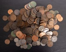 A quantity of mixed coinage, including Crowns, pennies, half crowns, and world coins.
