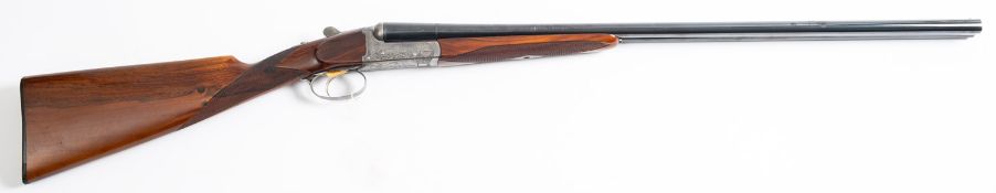 A Fabrica 20 bore s/s shotgun, Serial number 123402, 28 inch barrel, raised rib, box lock action,
