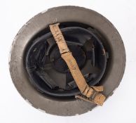 A WWII Royal Navy steel helmet, maker Rubery Owen & Co. Ltd.