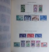 A mint and used collection of KGVI British Empire stamps in an SG printed album with many complete